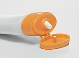ATADAN Opalovací mléko s karabinkou SPF 30, objem 30 ml, oranžová
