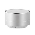 Hliníkový bluetooth reproduktor se světlem na spodní straně, matně stříbrný