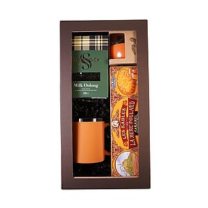 DARELA ORANGE Sada obsahující čokoládové pralinky, čaj, svíčku a oranžový hrnek, v dárkové krabici - reklamní předměty