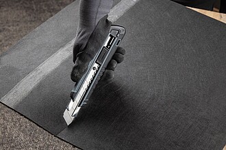 Řezák s měkkým úchopem, černo šedý